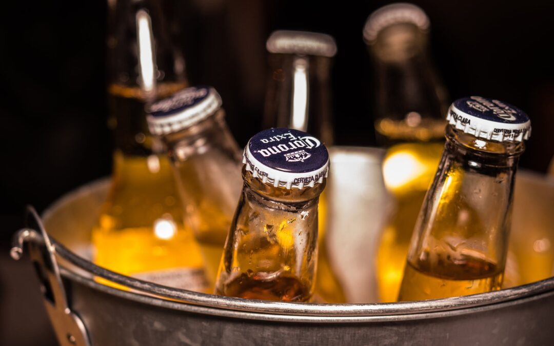 photo of corona extra bottles on bucket
