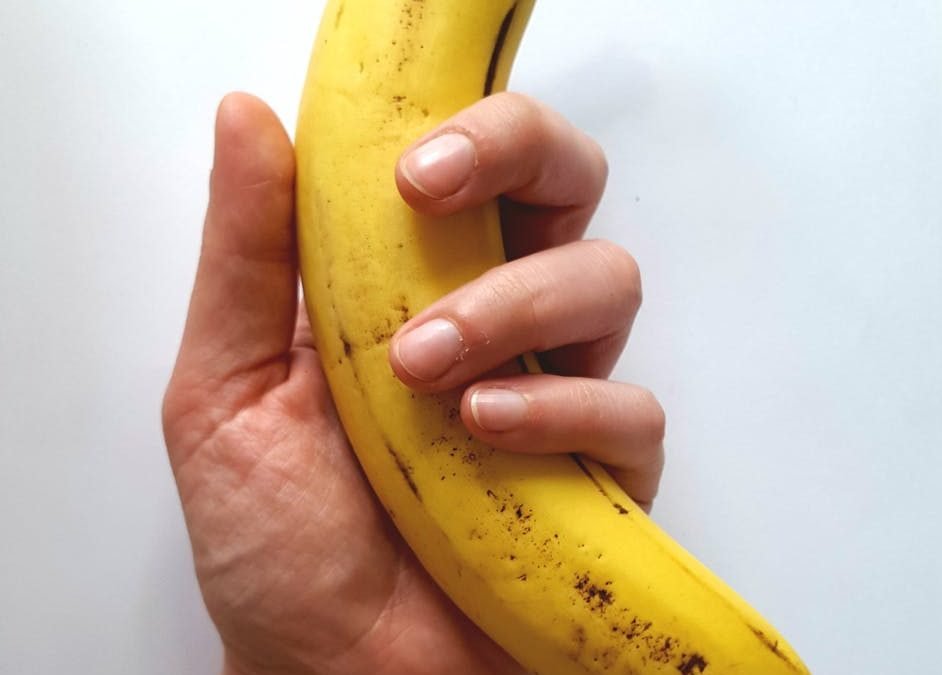 yellow banana on hand