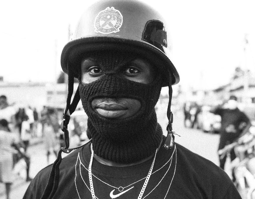 dangerous man in balaklava and helmet