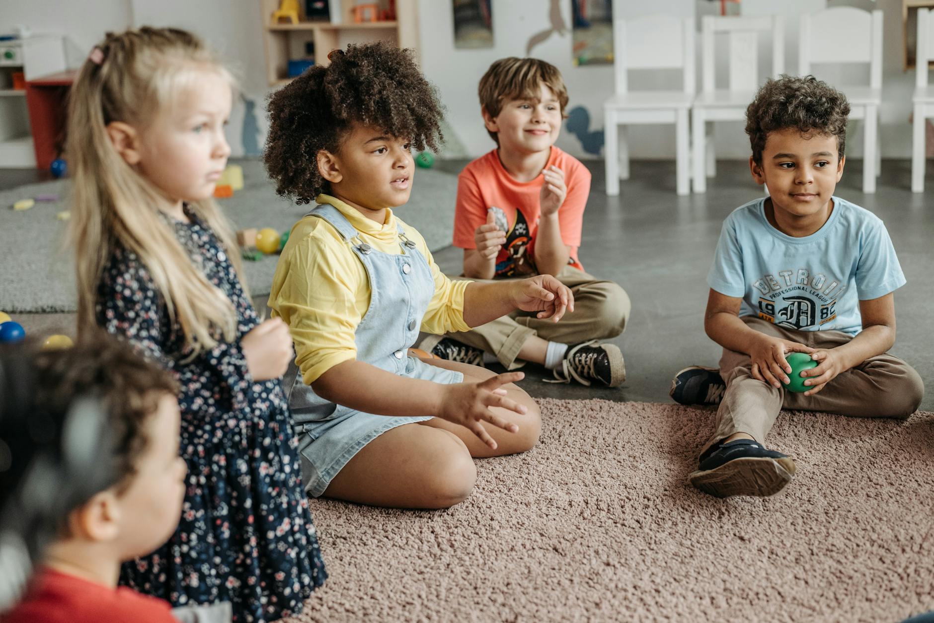 children sitting on the floor