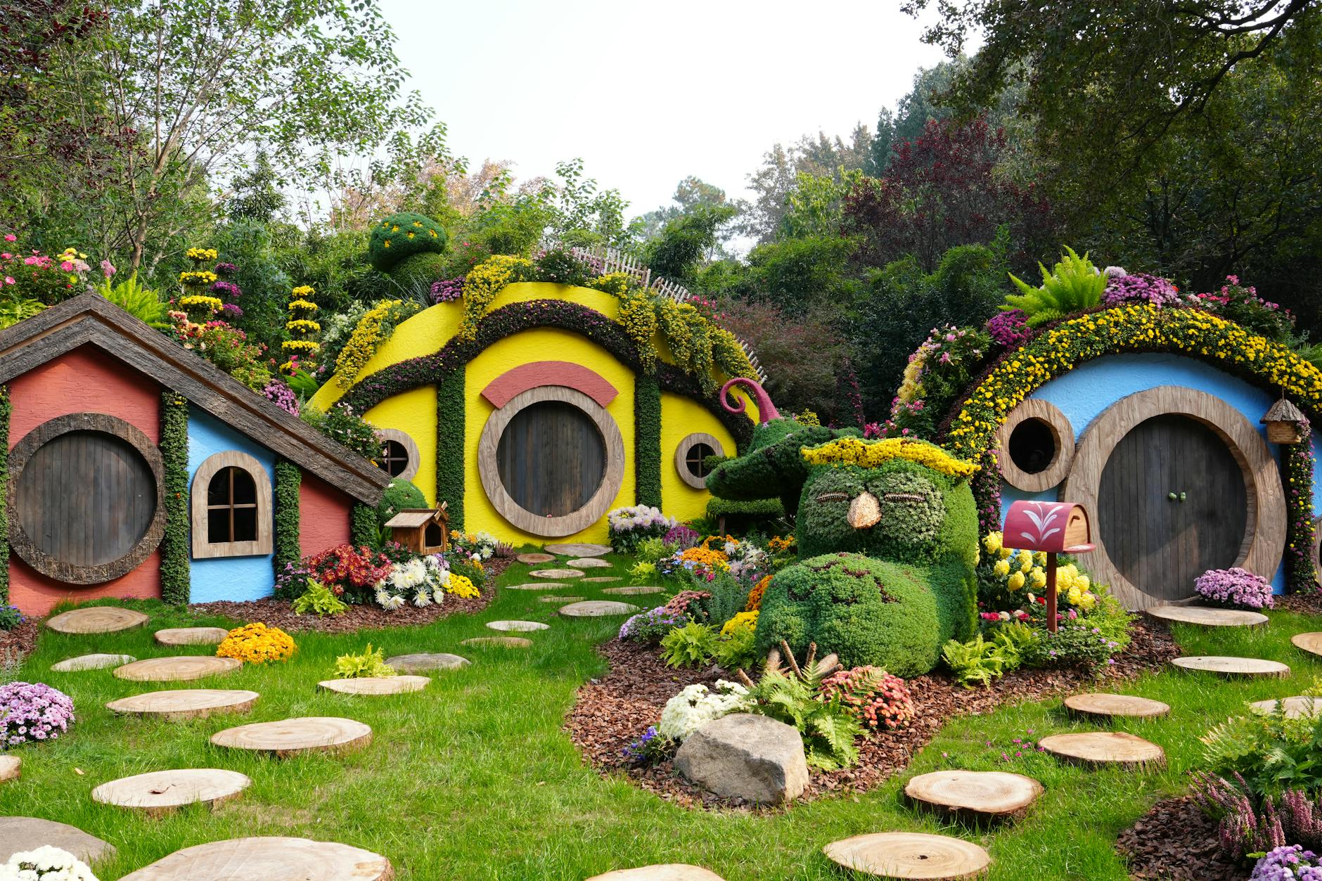 enchanting floral hobbit houses in garden