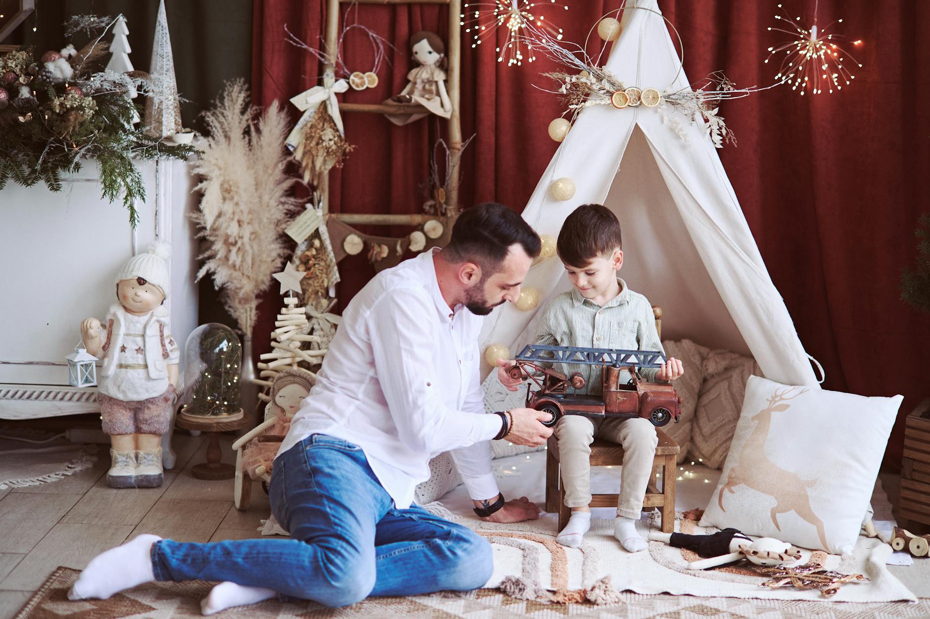 father giving his son a christmas present