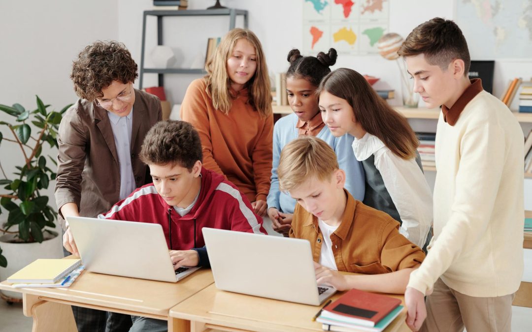 a children looking the laptop