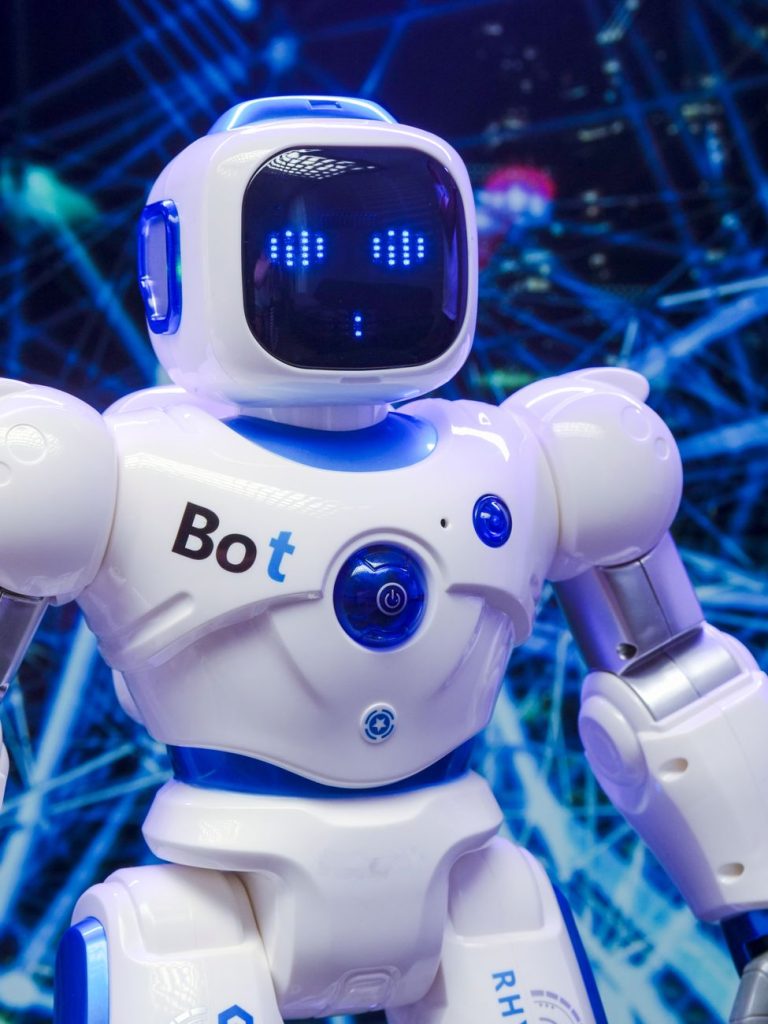 Current image: white robot action figure