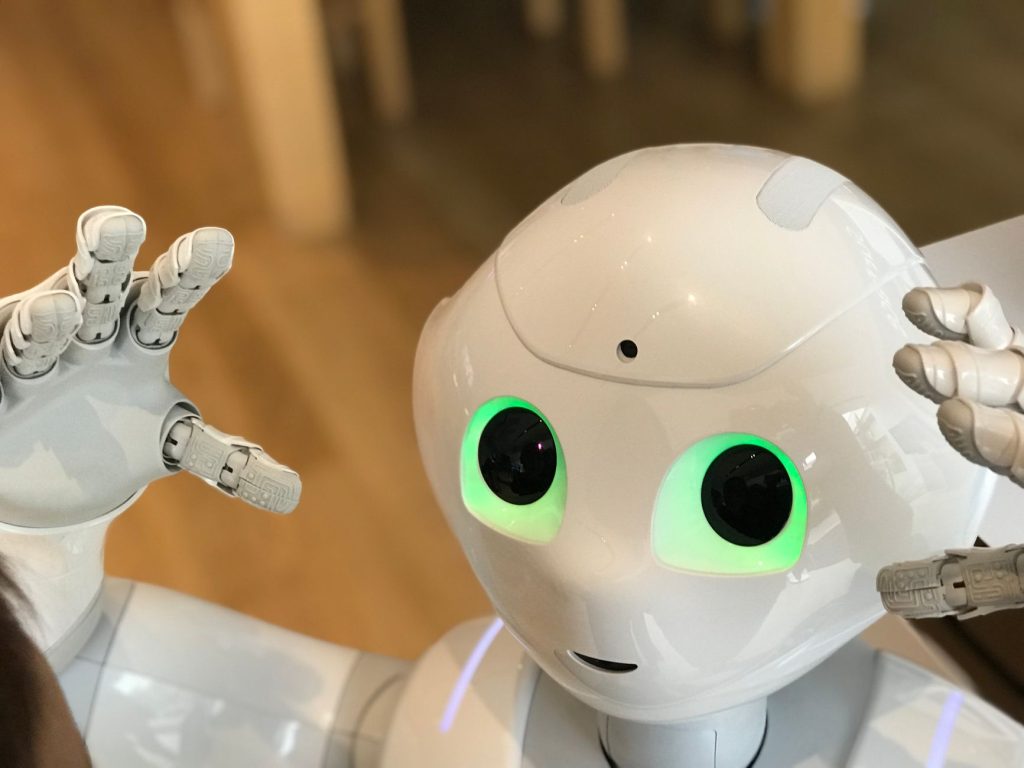 Current image: close up shot of a white robot