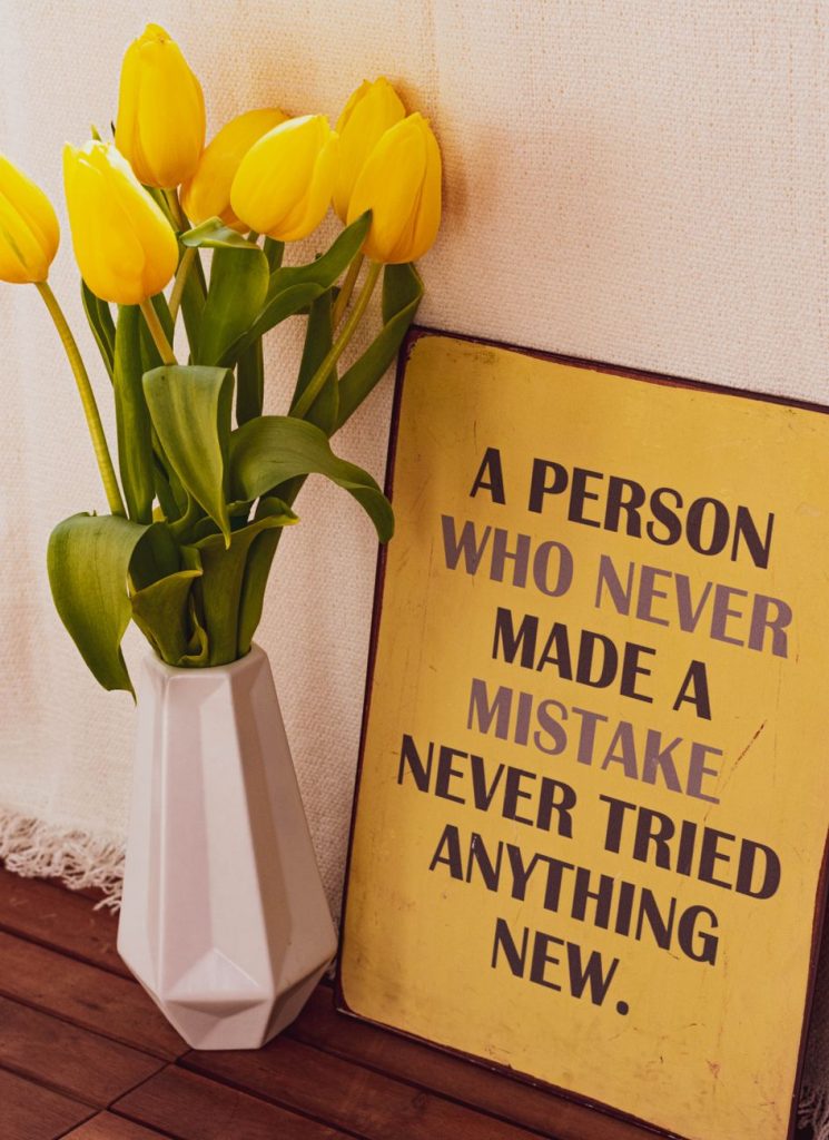 Current image: photo of yellow tulips in a vase