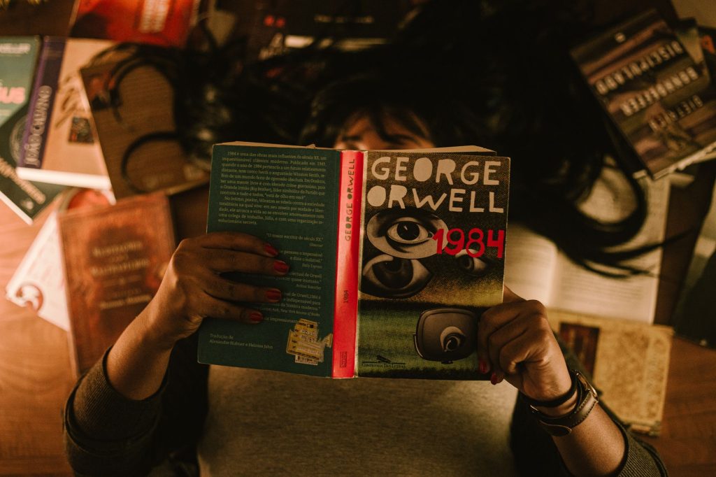 Current image: a person reading a book
